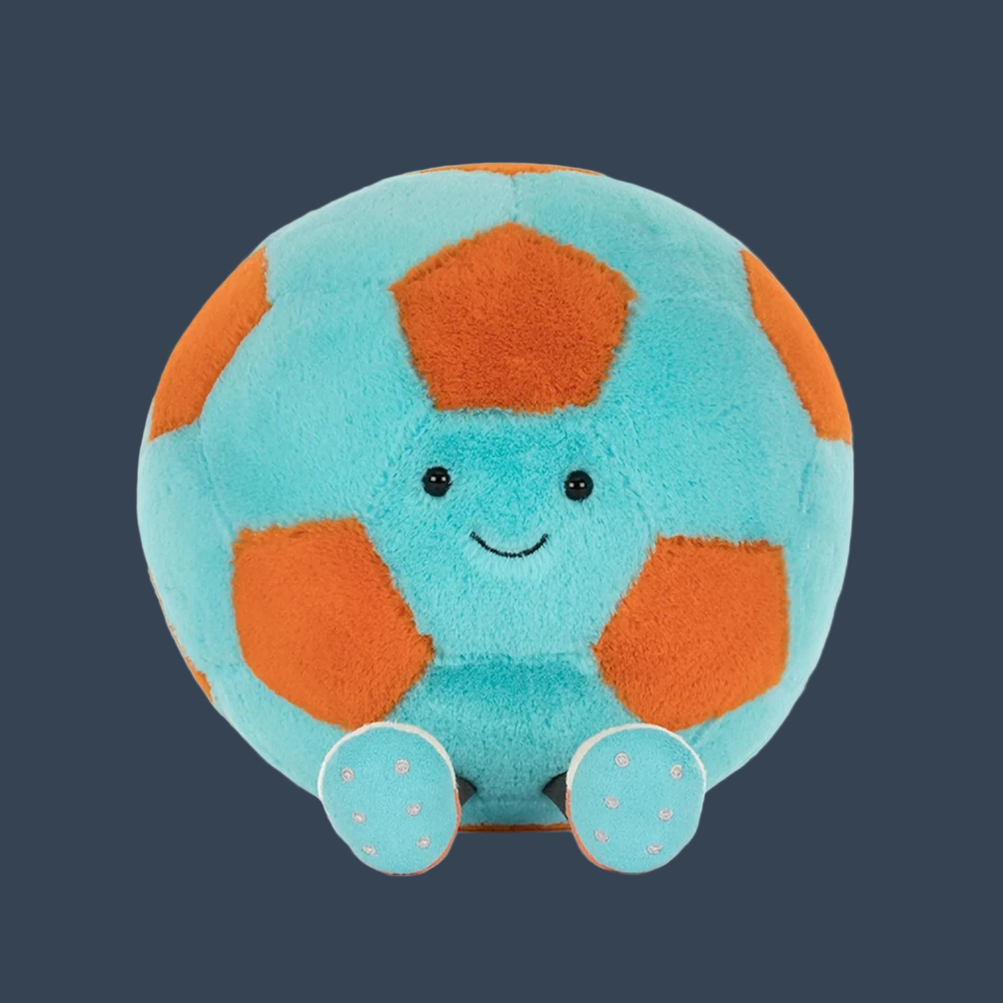 plush toy soccer ball orange and teal. 