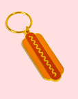 A hot dog shaped keychain with two sides. One keychain per purchase.