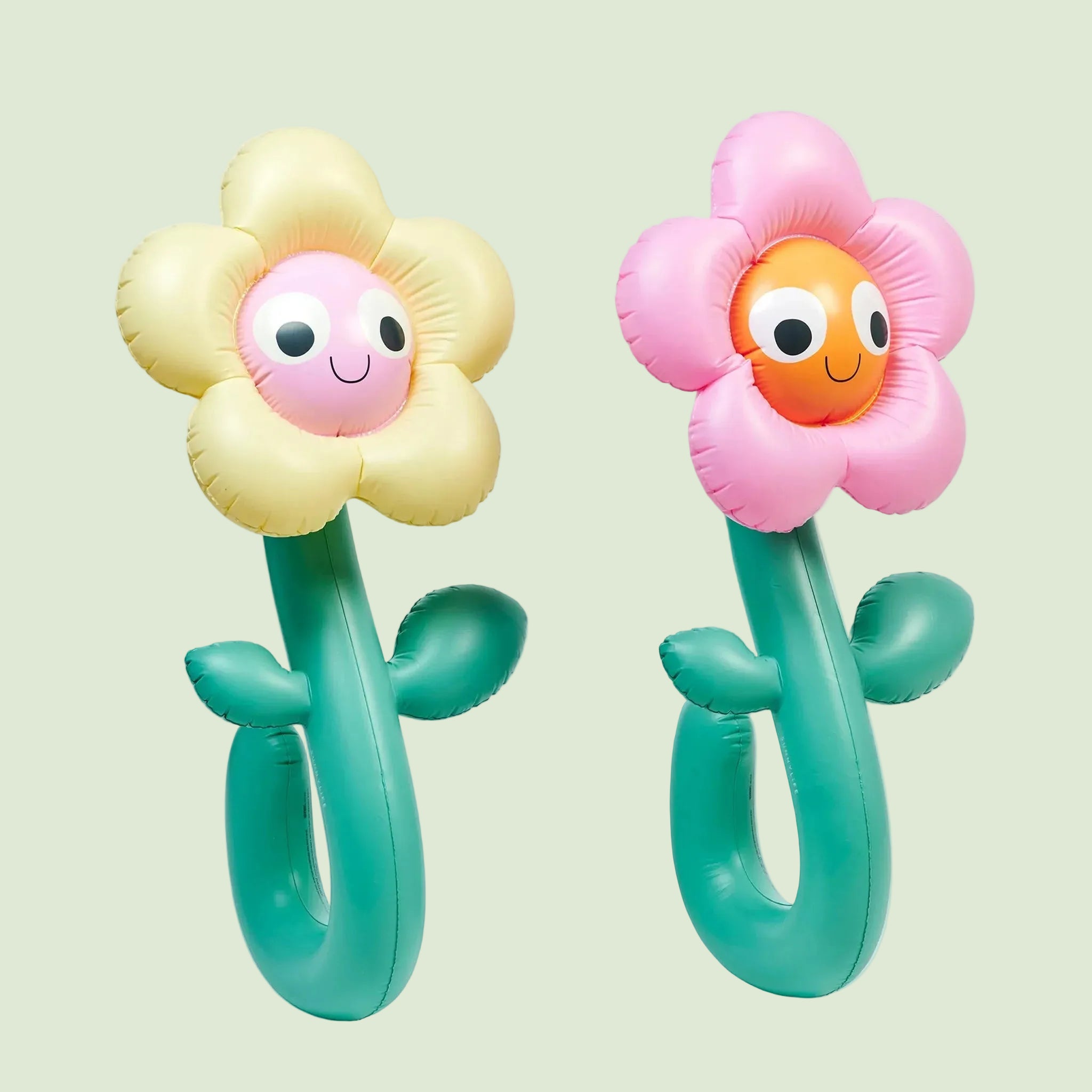 A set of two flower shaped pool floaties. 