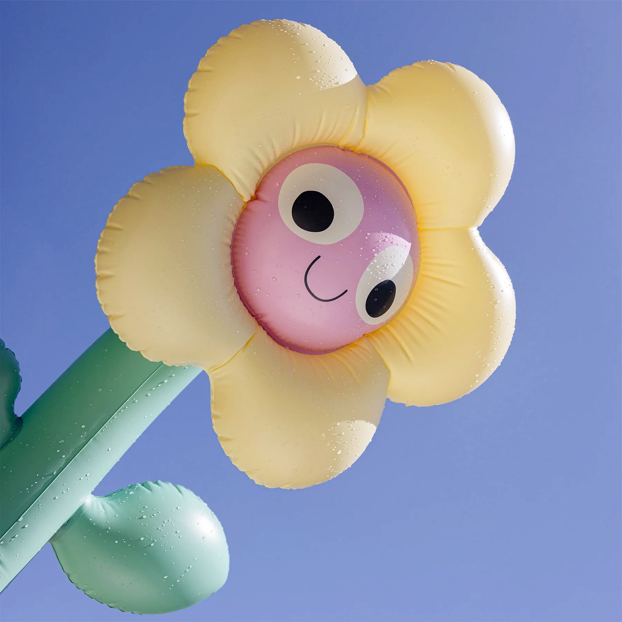 A set of two flower shaped pool floaties. 