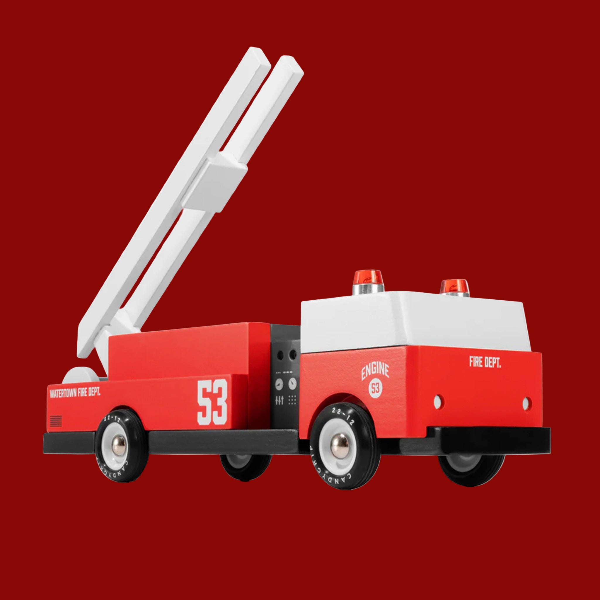 A red and white fire truck wooden toy. 