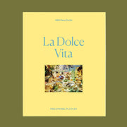 A yellow puzzle box with an image of the puzzle with an Italian lemon theme and blue text that reads, 'La Dolce Vita'. 