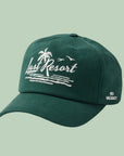 A dark green baseball cap with white embroidered text that reads, 'Last Resort'. 