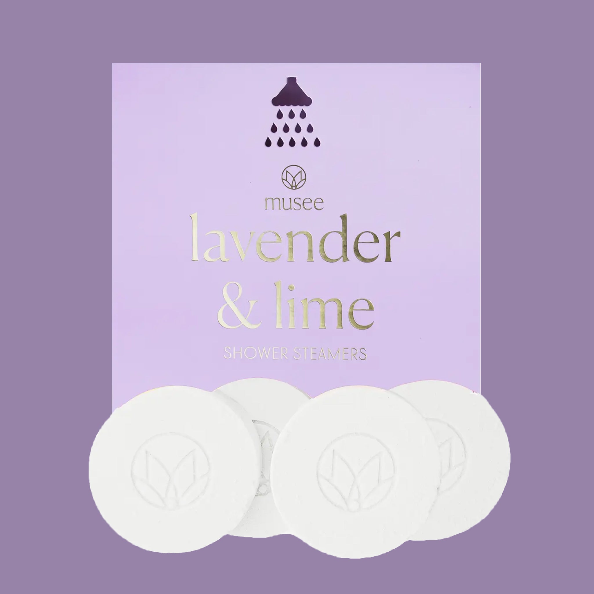 A light purple box of shower steamers with text on the front that reads, "musee lavender & lime shower steamers". 