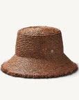 A brown straw bucket hat.