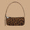 A black and brown leopard shoulder bag. 
