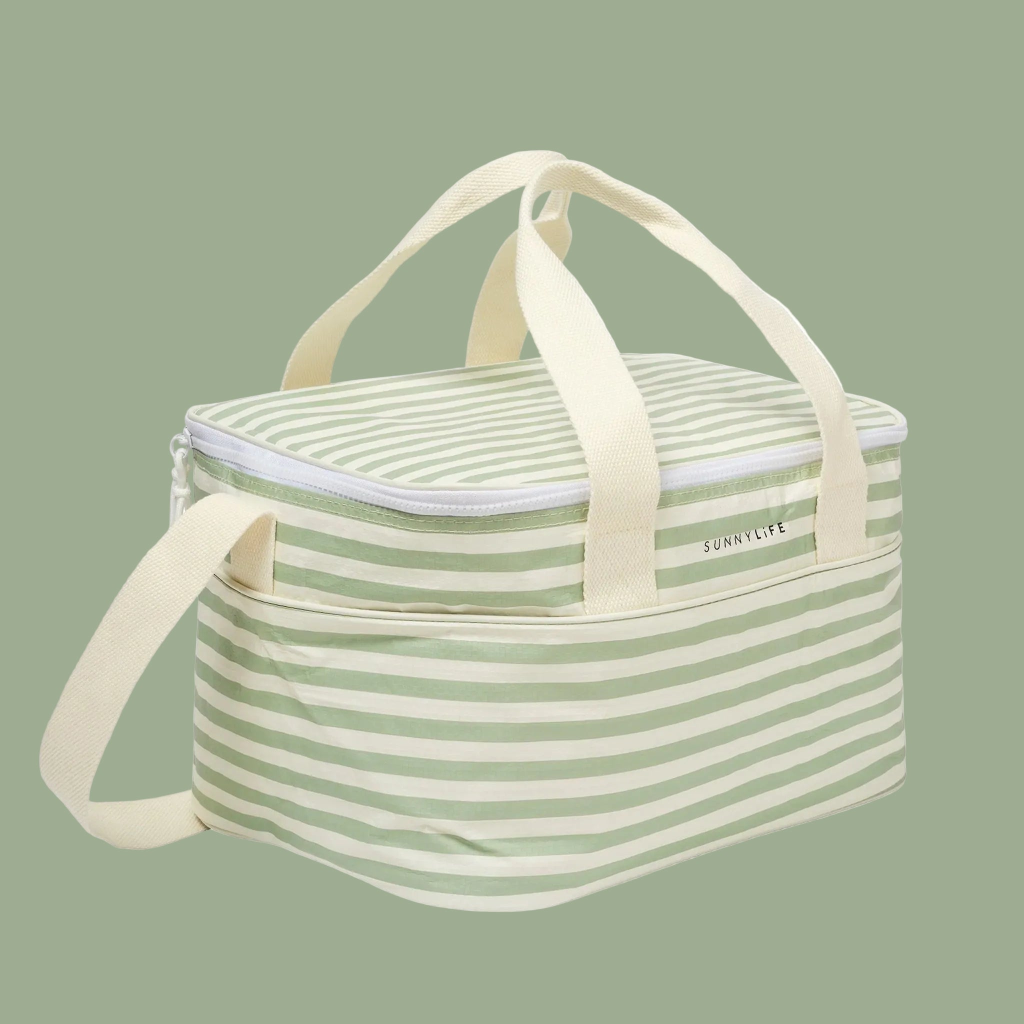 A cream and green stripe cooler bag. 