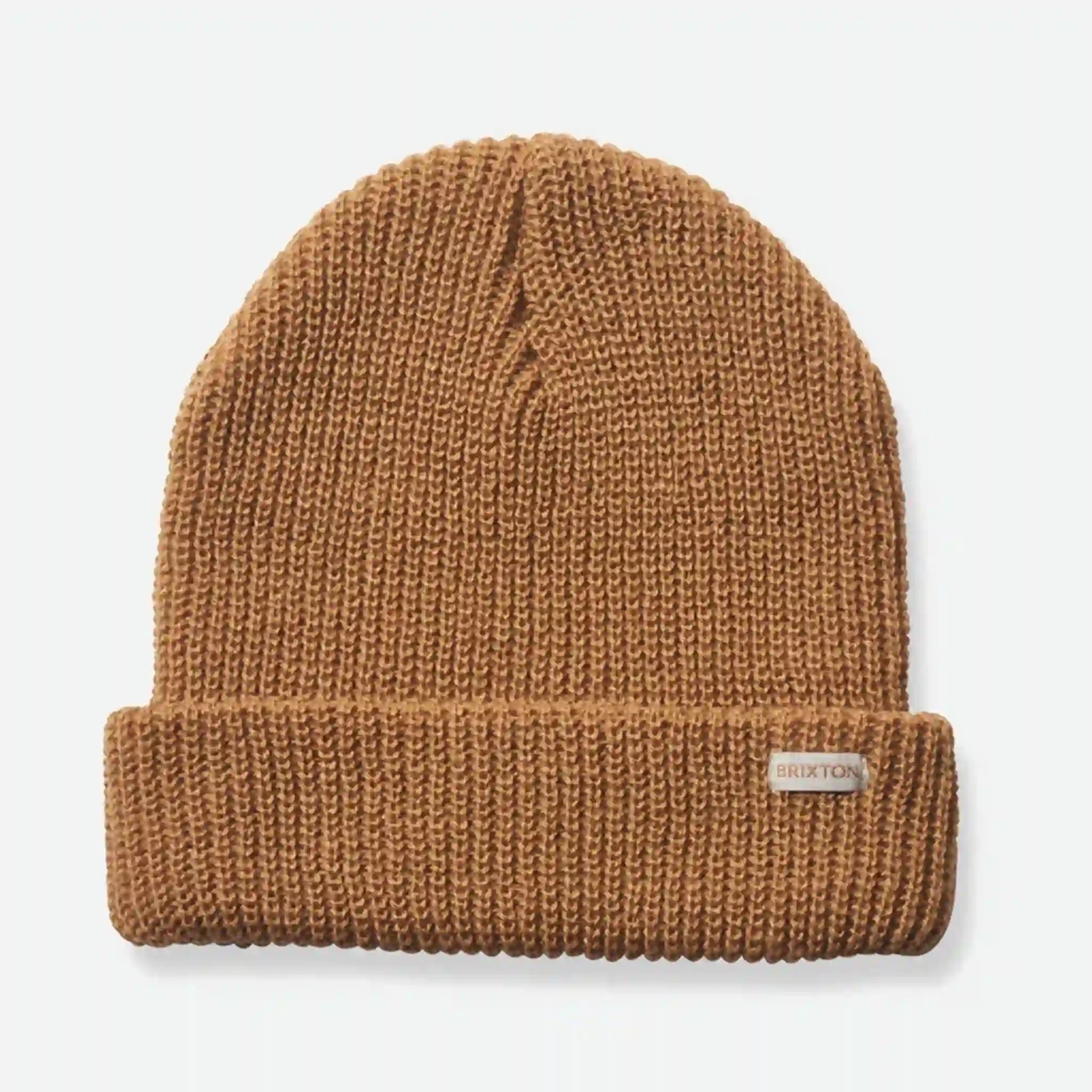 A tan ribbed beanie with a small rectangle label on the right corner that reads, "Brixton" on a white background.