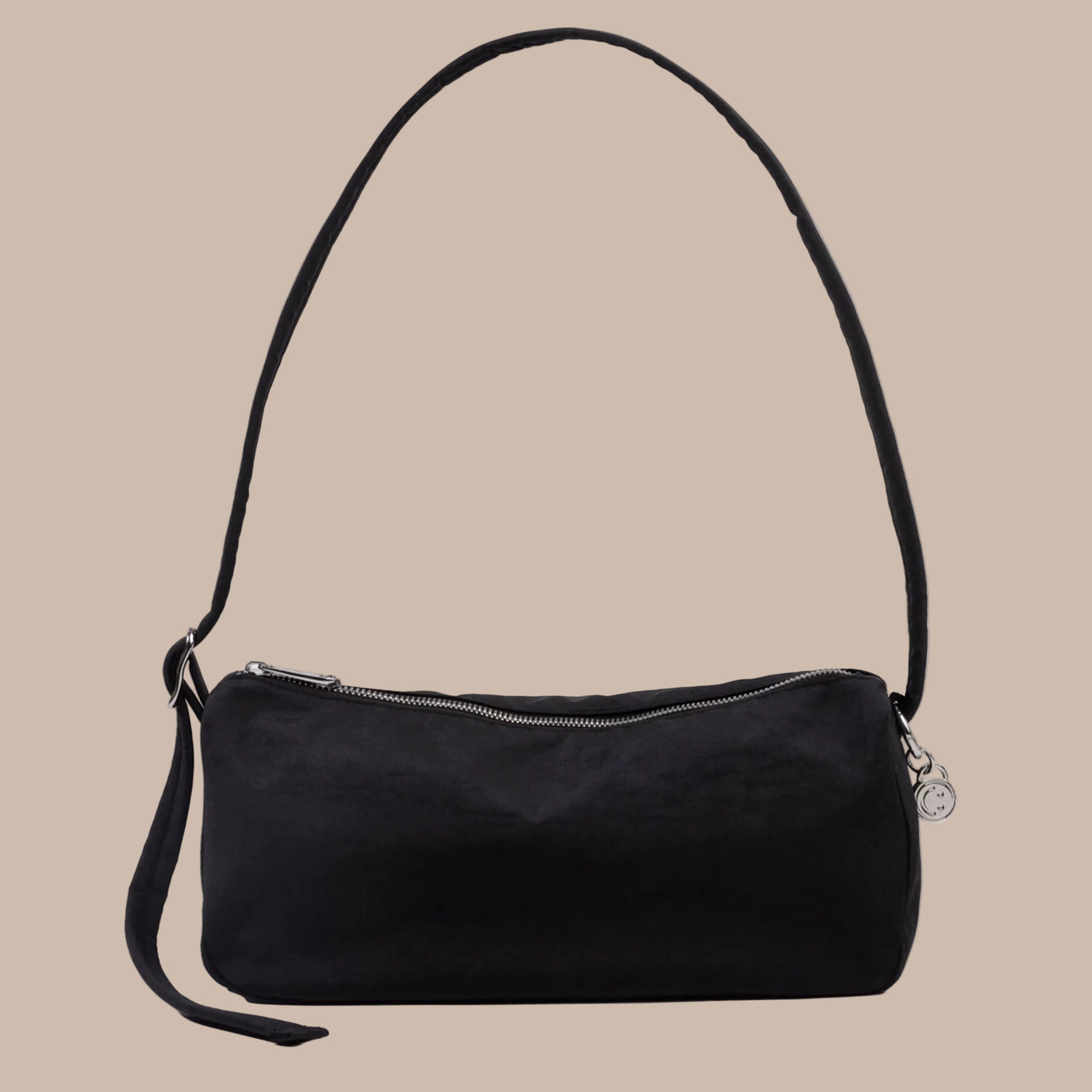 A black loaf shaped nylon shoulder bag. 
