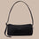 A black loaf shaped nylon shoulder bag.