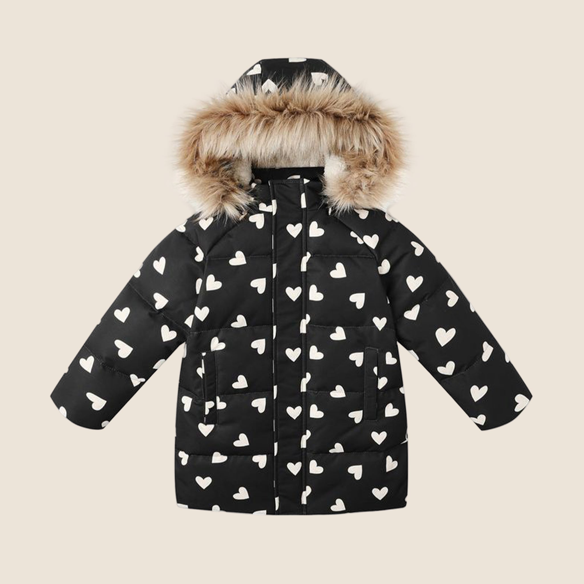 A black puffer jacket for children with a brown fur lined hood and a white heart pattern.