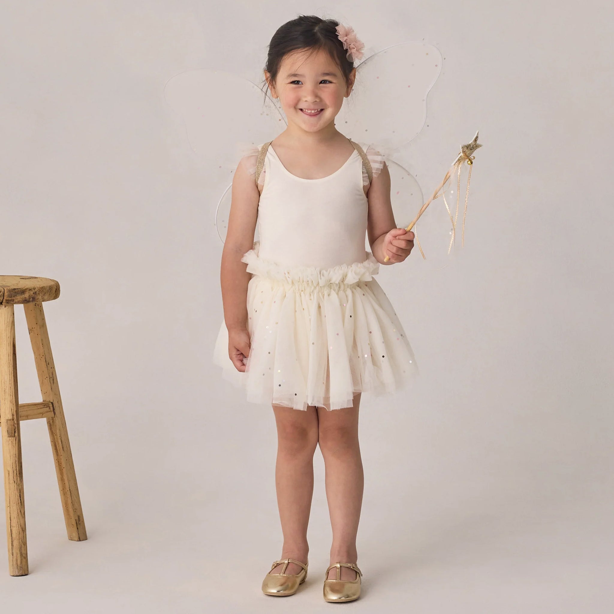 An ivory sparkle tutu and leotard tank top set. 