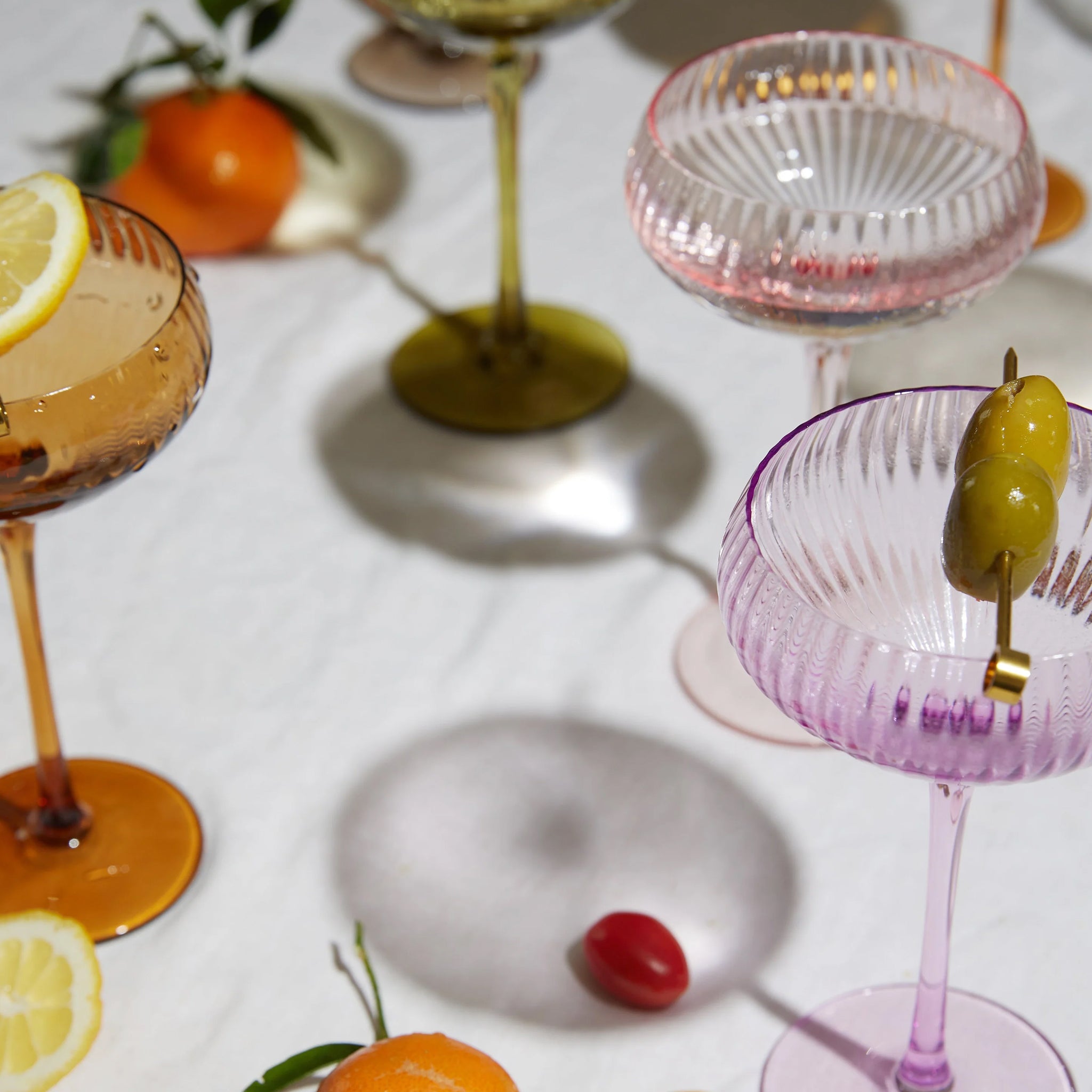 A light purple coupe glass. 