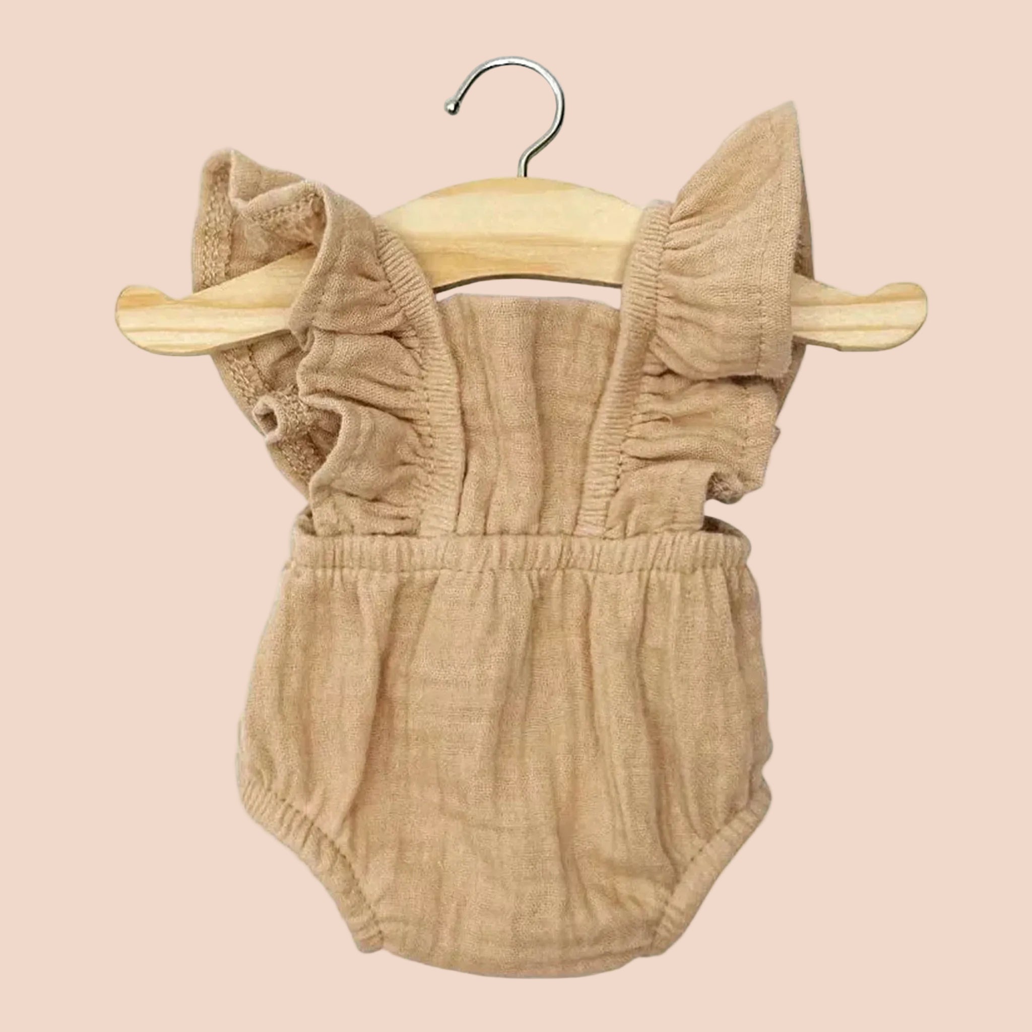 A brownish/tan romper for Minikane dolls. 