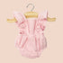 A light pink romper outfit for Minikane dolls. 