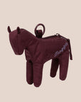 A dark reddish brown horse shaped mini bag charm with a zipper opening. 