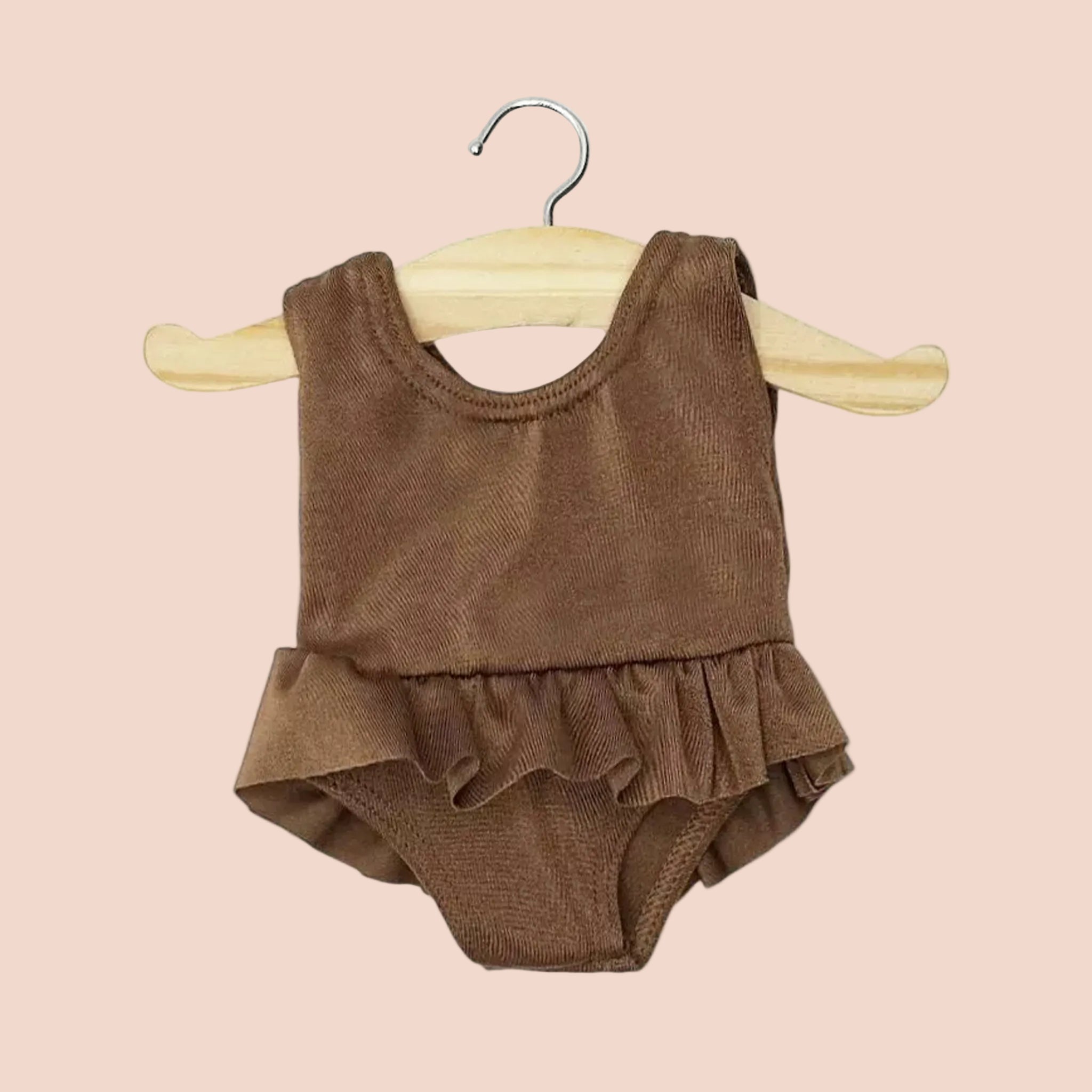 A brown leotard for dolls. 