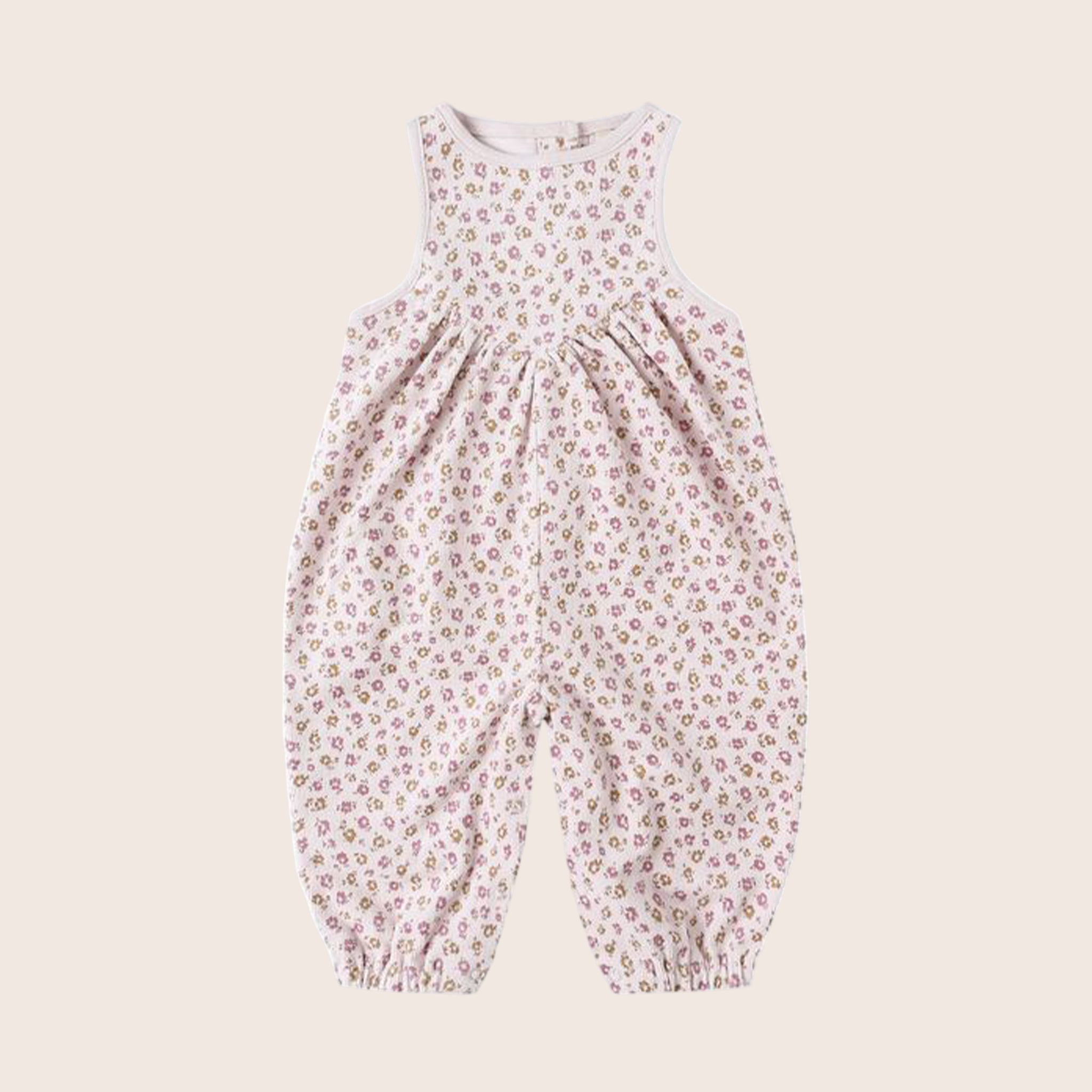 A pair of light pink floral overalls for kids. 