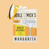 A cream and orange packet of cocktail mix that reads, "Noble Mick's Single Serve Craft Cocktails Mango Coconut Margarita" in black letters photographed next to a slice of mango.