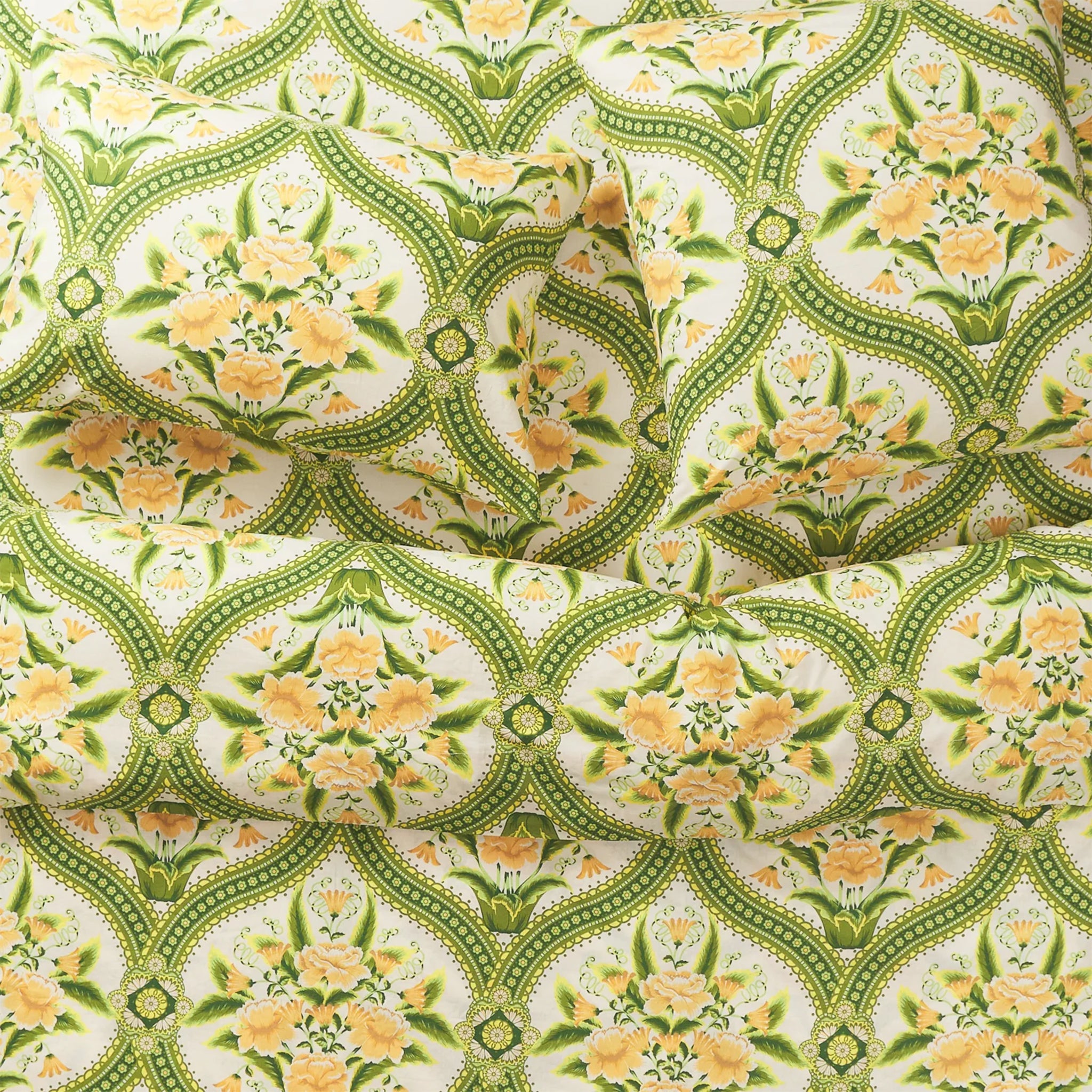 A green and yellow floral duvet cover. 
