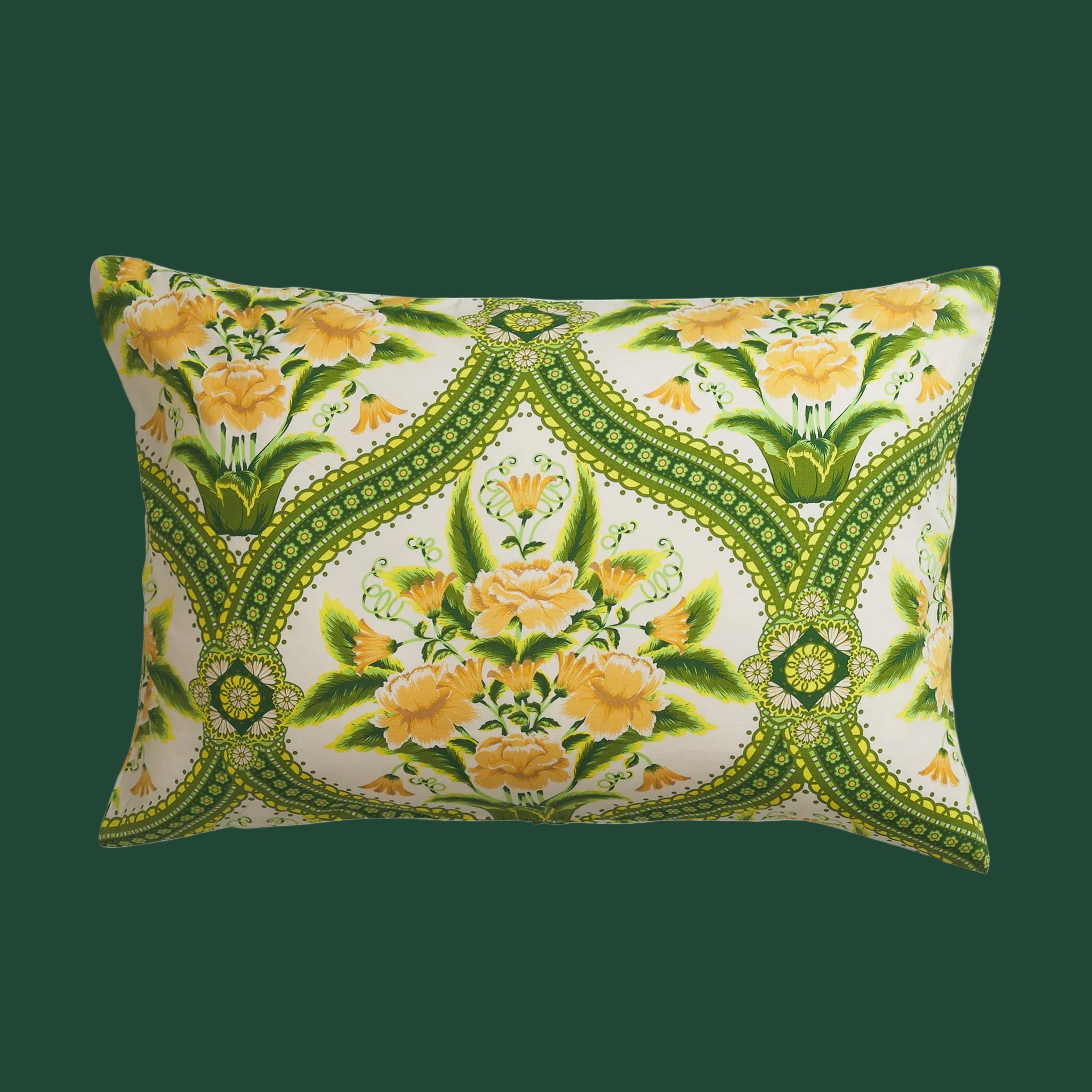 a green and yellow floral pillowcase. 