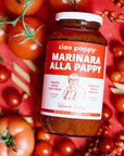 A glass jar of marinara sauce with white text that reads, 'ciao pappy Marinara Alla Pappy'. 