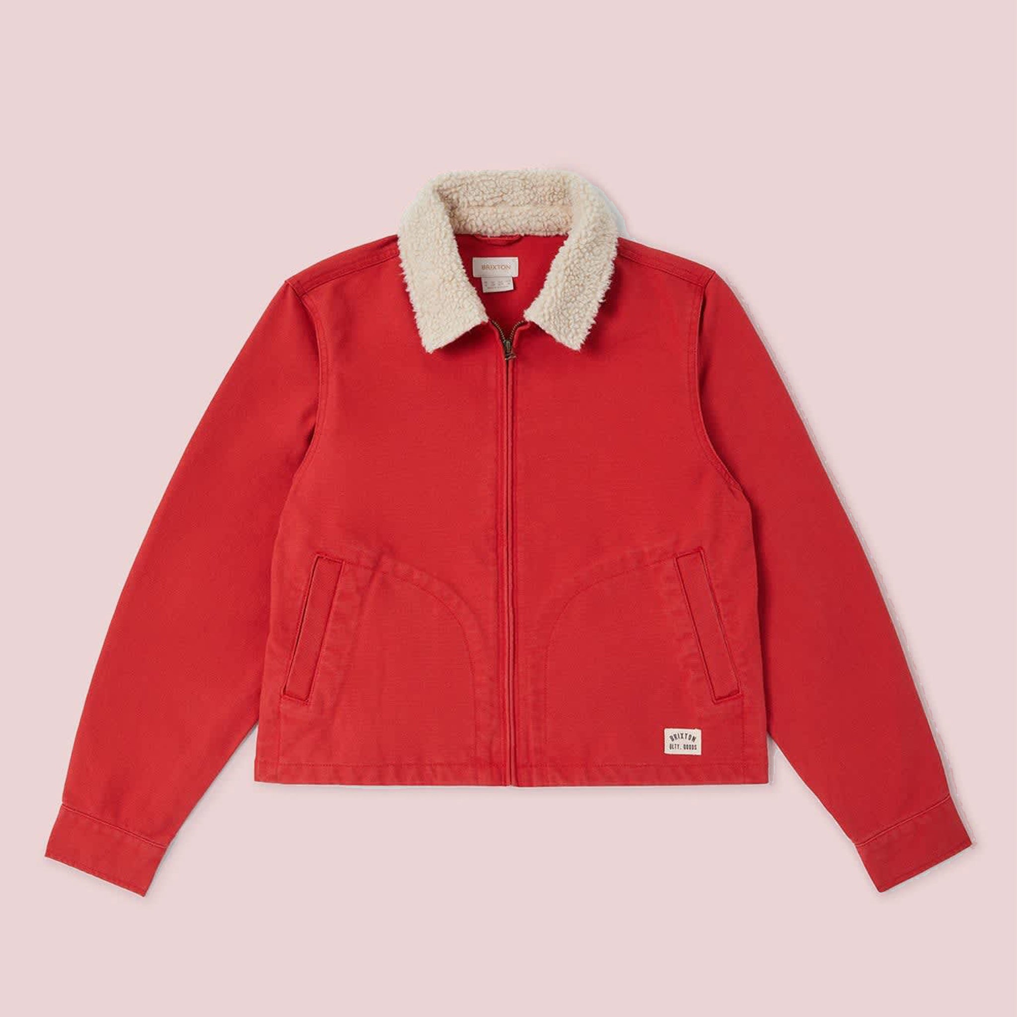 Red zip up jacket with tan fur collar trim. 