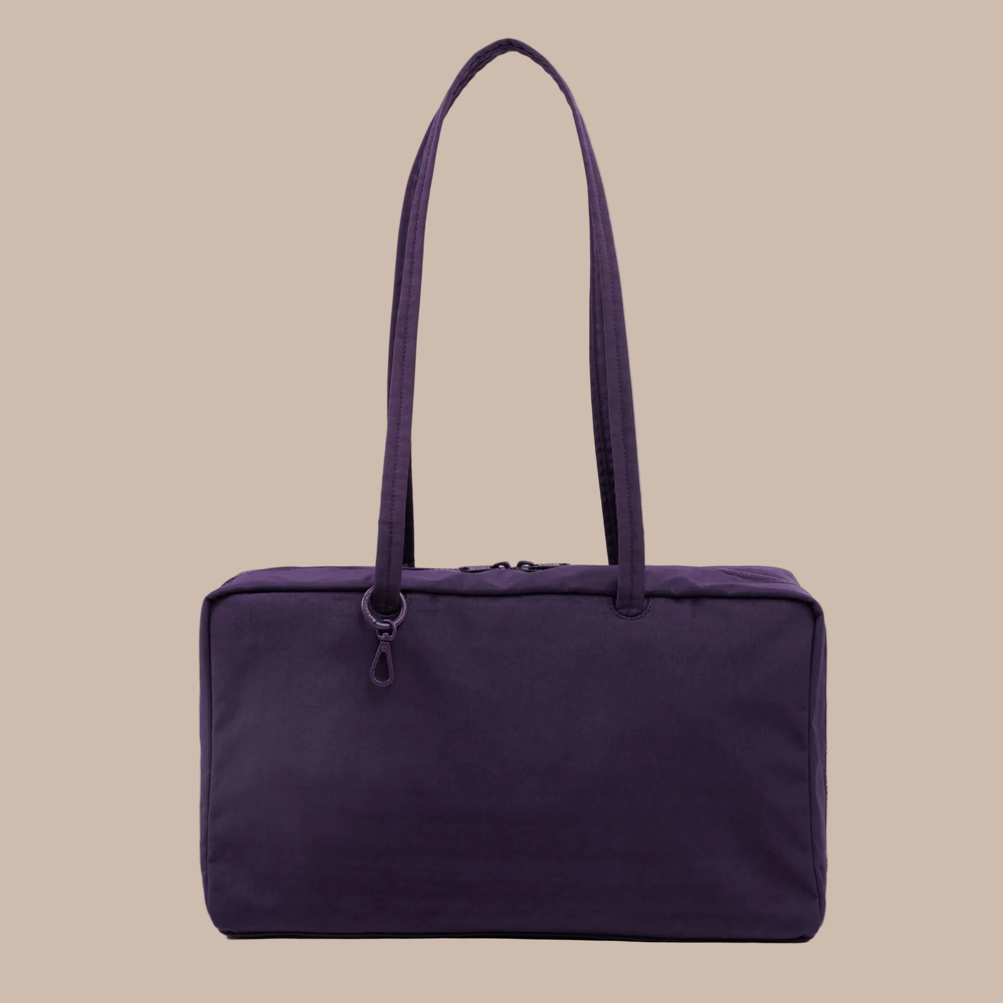 A dark purple rectangle shoulder bag. 