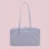 A light blueish-purple nylon rectangle shaped shoulder bag.