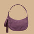 A purple crescent bag shoulder bag.