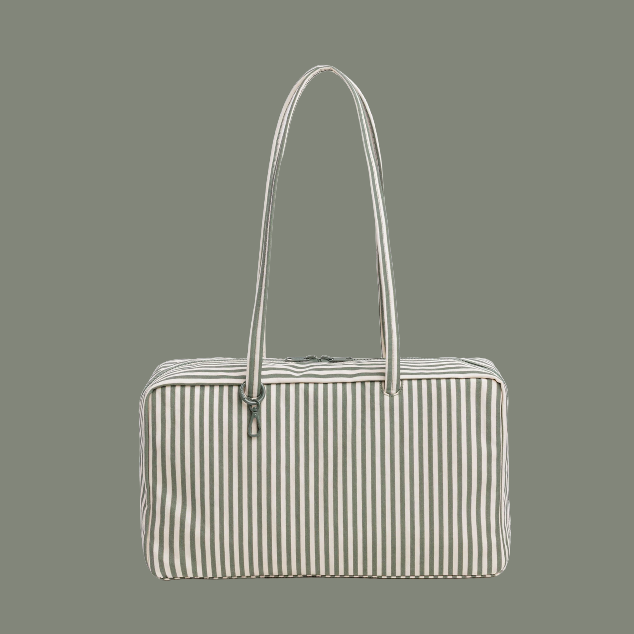 sage striped nylon bag on a sage green background.