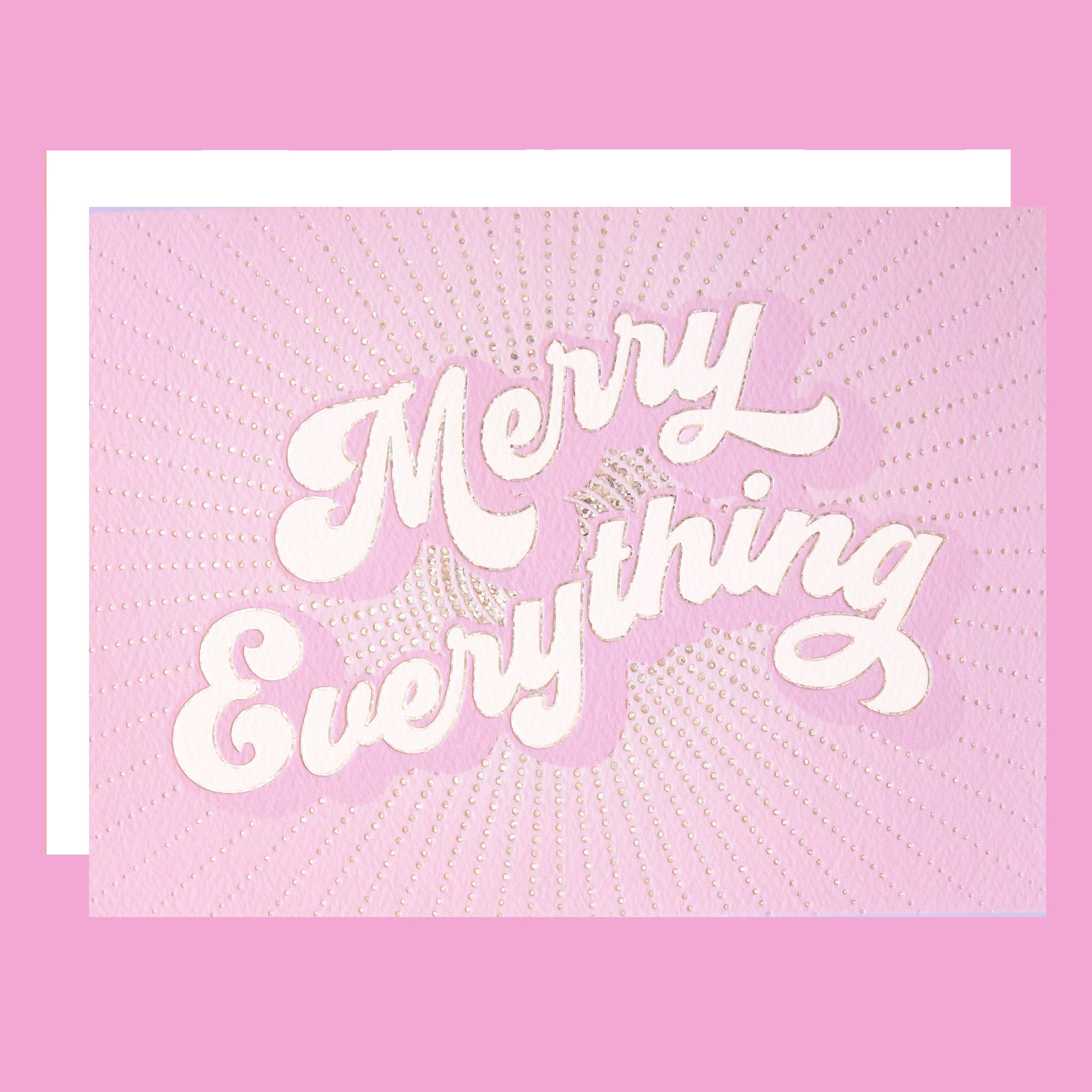 Card with 'Merry Everything' text on a pink background