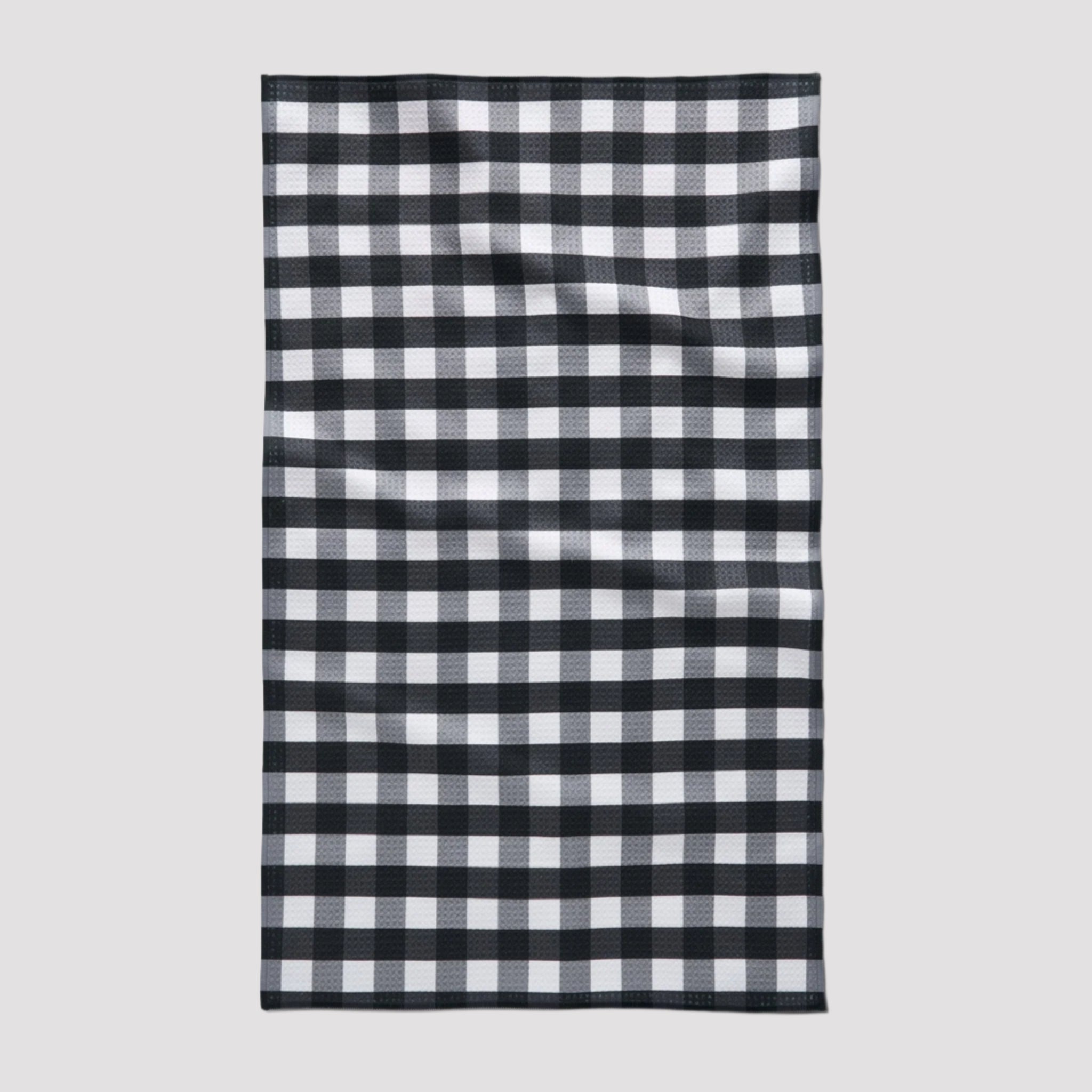 A black and white checkered kitchen tea towel. 