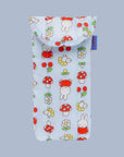 A puffy eyeglass sleeve case with a Miffy, cherry and mushroom print. 