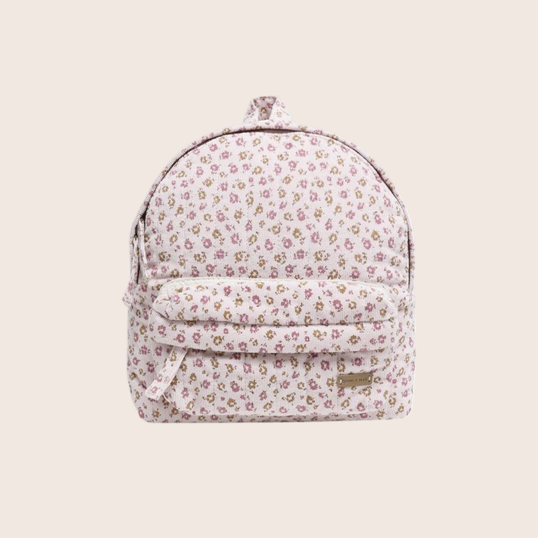 A light pink floral print backpack. 
