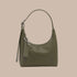 A dark green recycled leather shoulder bag.
