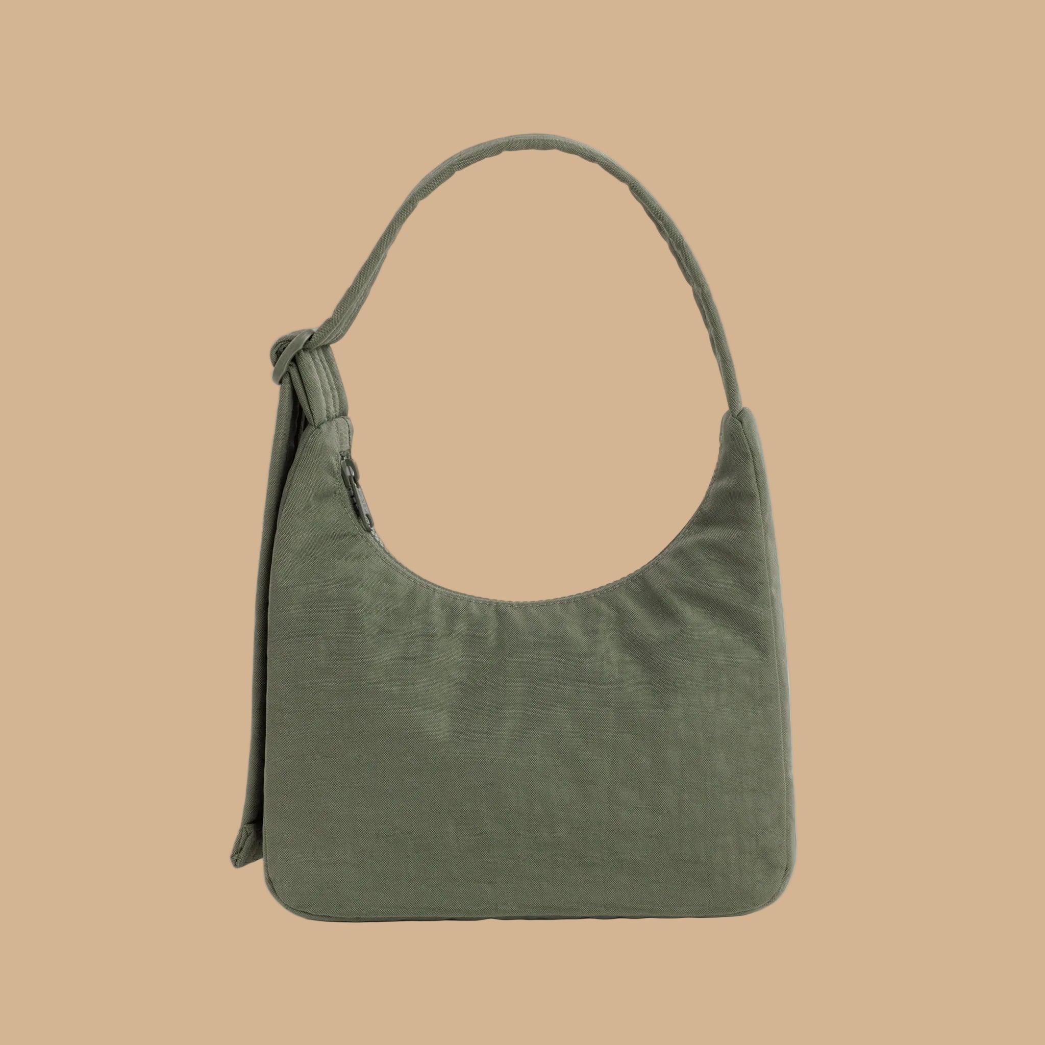 A green nylon mini bag purse.