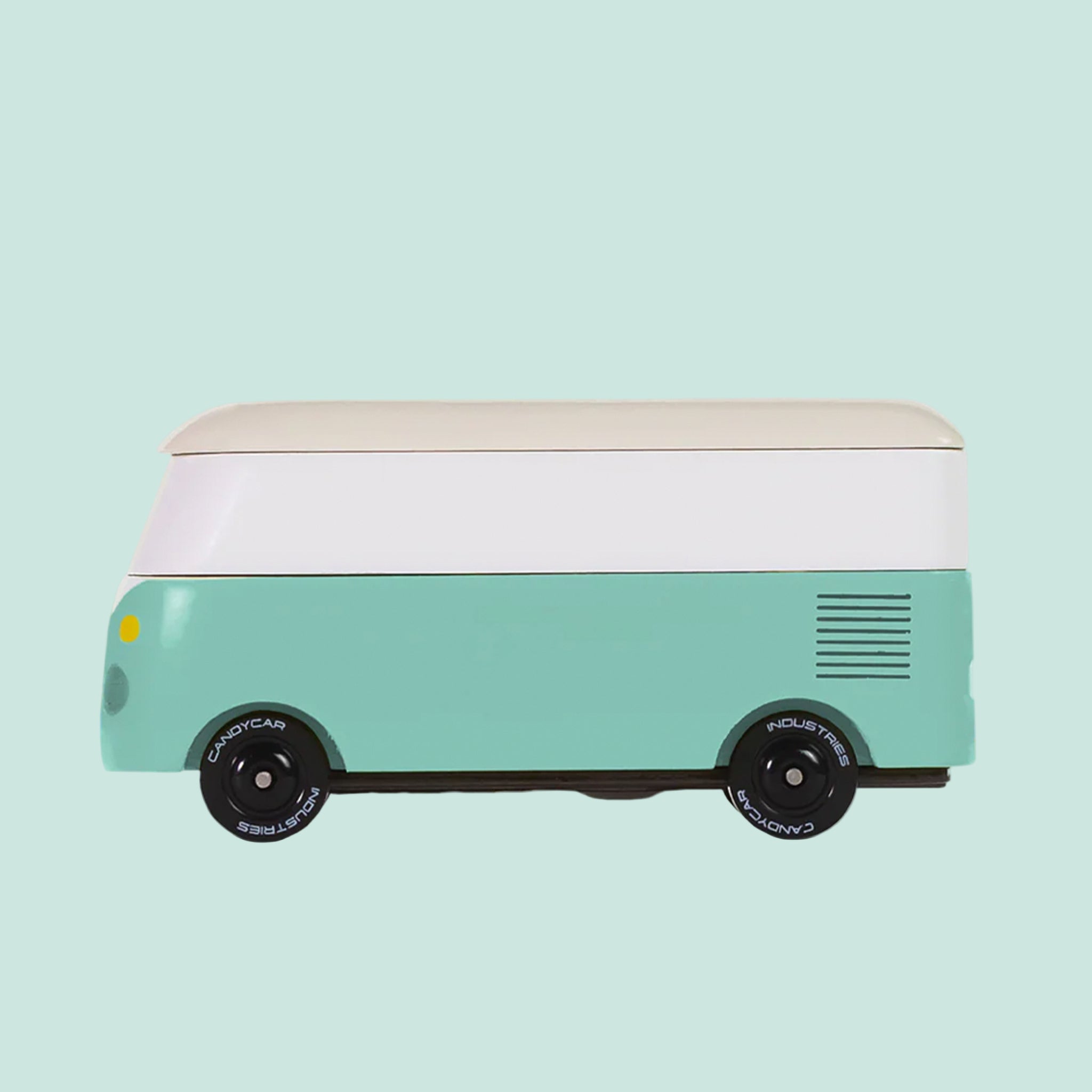 A VW teal wooden toy bus. 