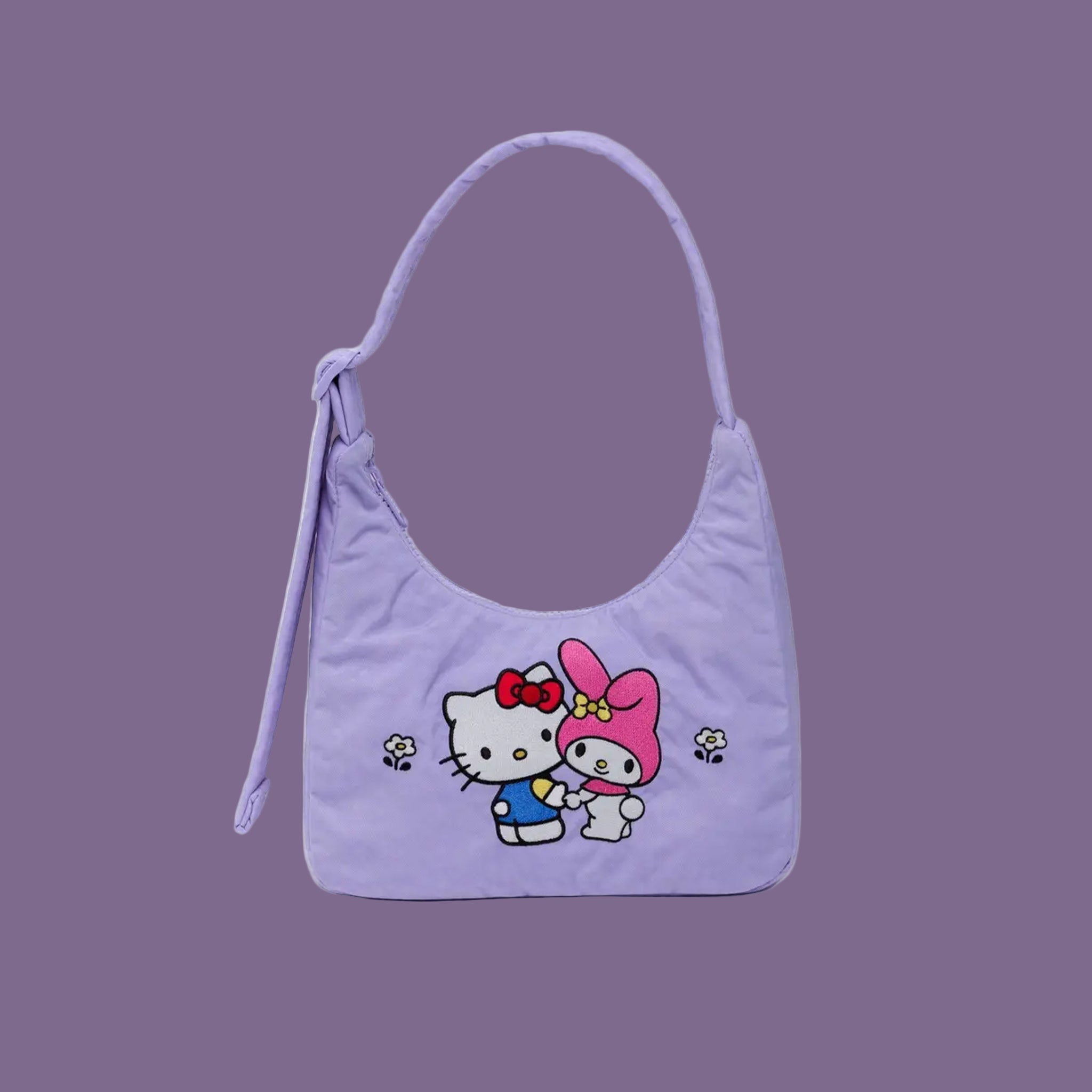 A light purple mini shoulder bag with embroidered my melody and hello kitty design. 