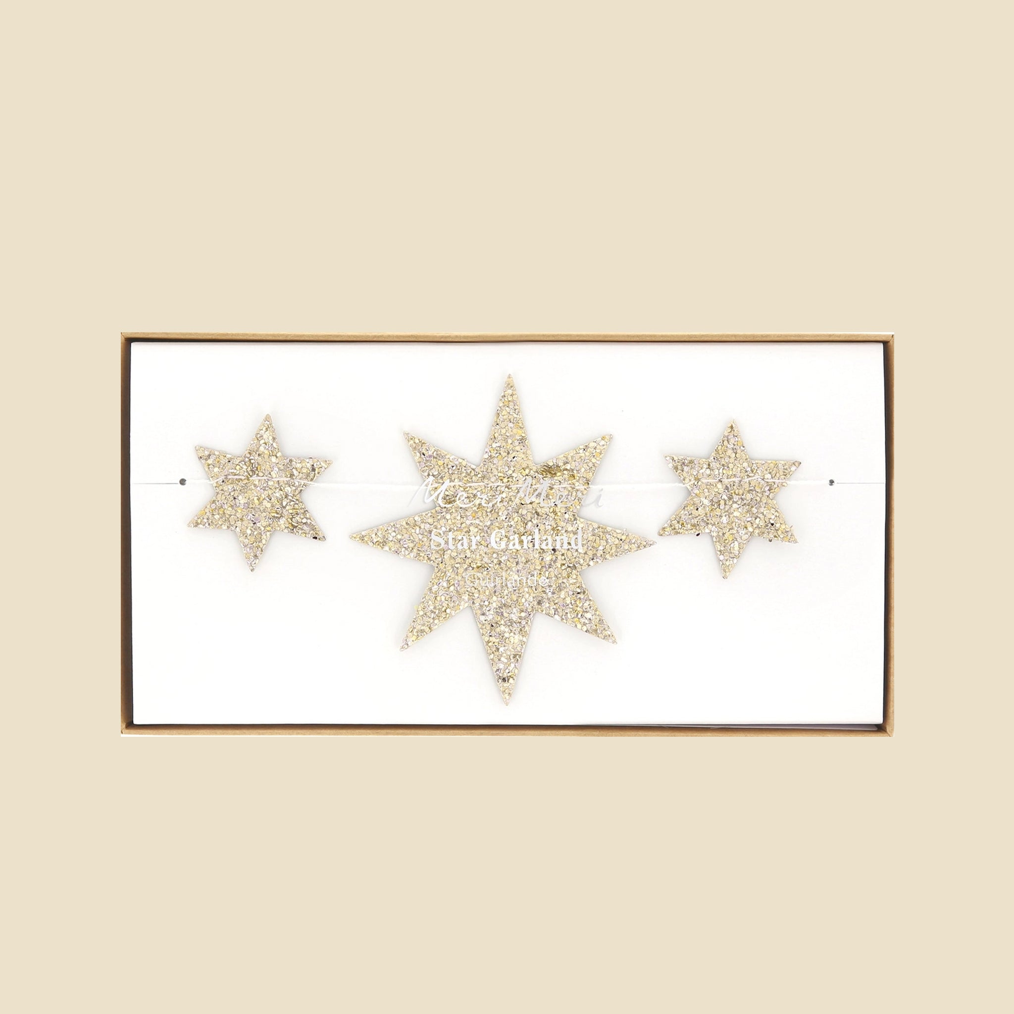 A garland in the shape of gold glitter stars that are two different shapes. 