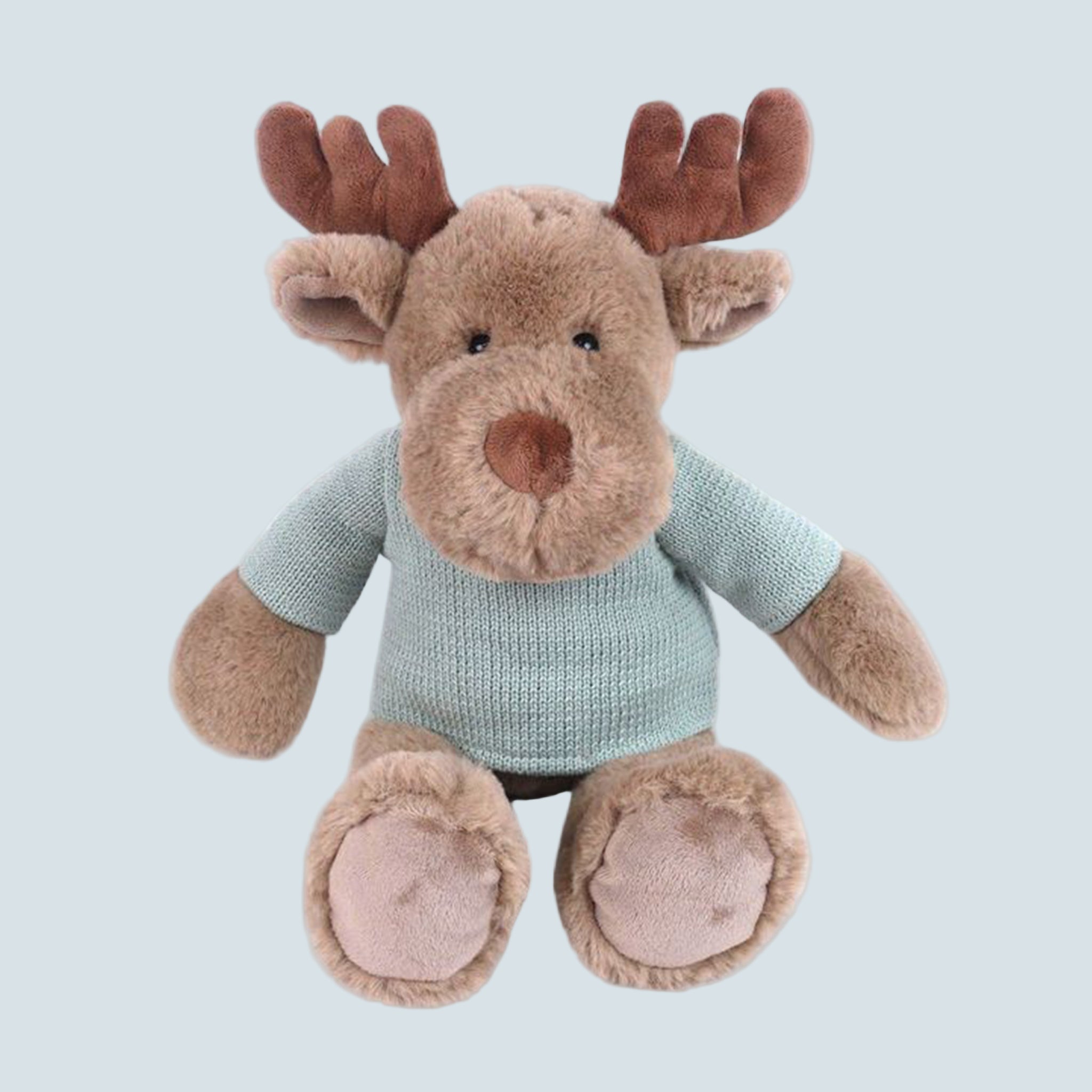 A fuzzy brown moose shaped stuff toy with a blue shirt on. 