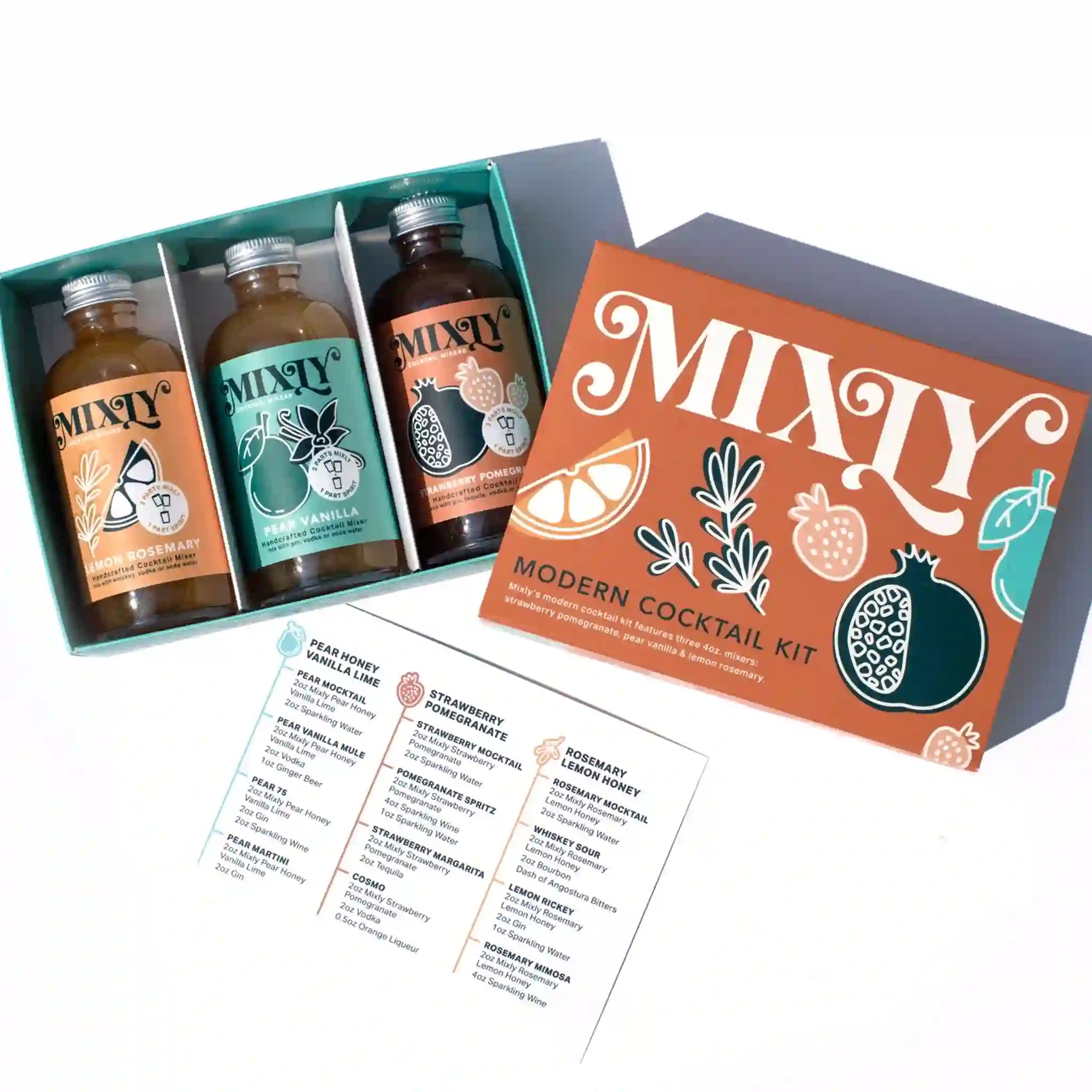 On a blue background is a modern cocktail kit with three glass bottles of cocktail mixes.