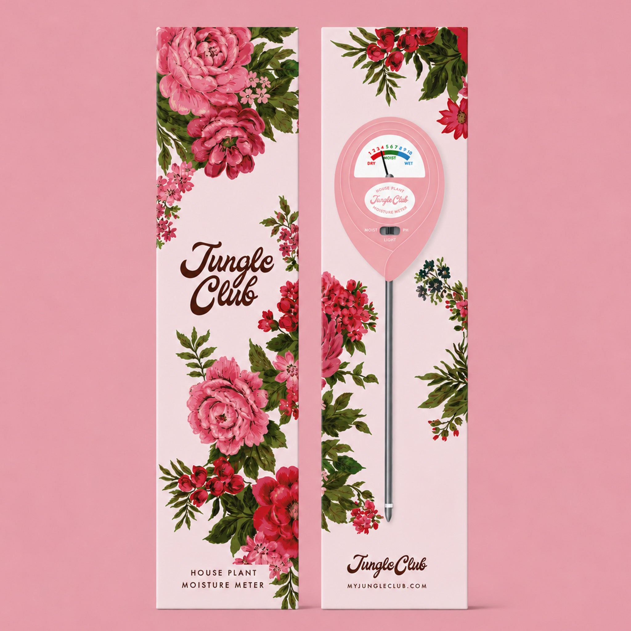 A pink moisture meter in a floral printed box.