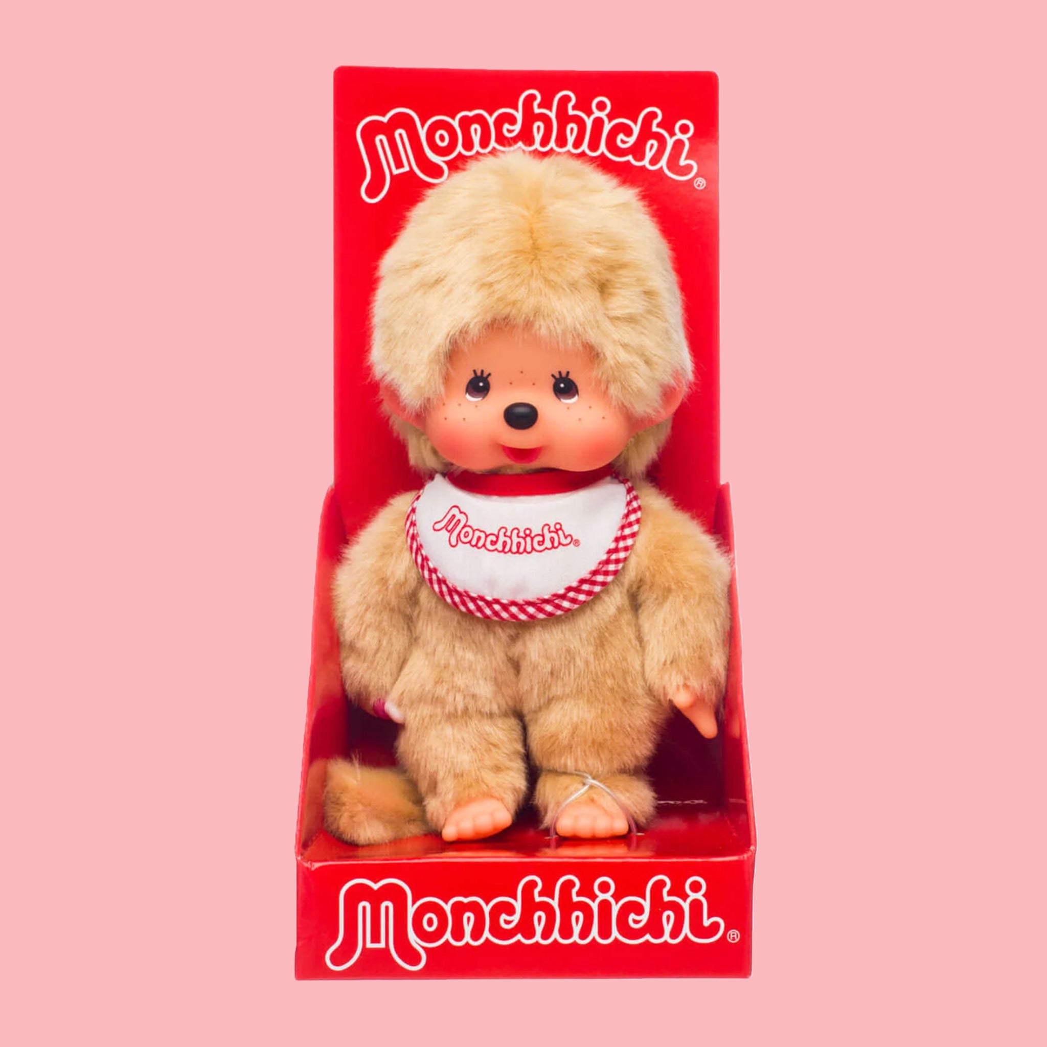 A tan Monchhichi doll.