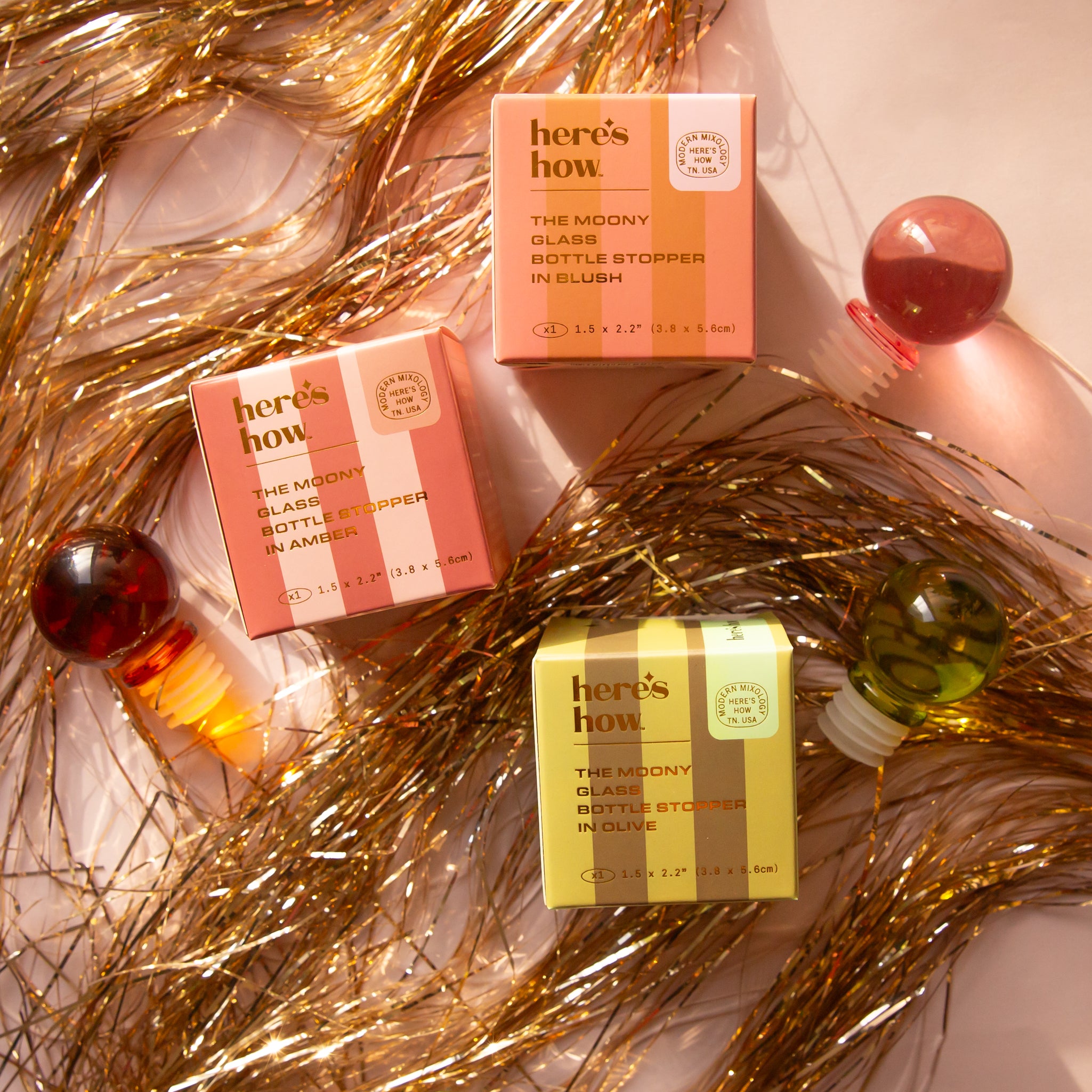 All three colors of the bottle openers. 