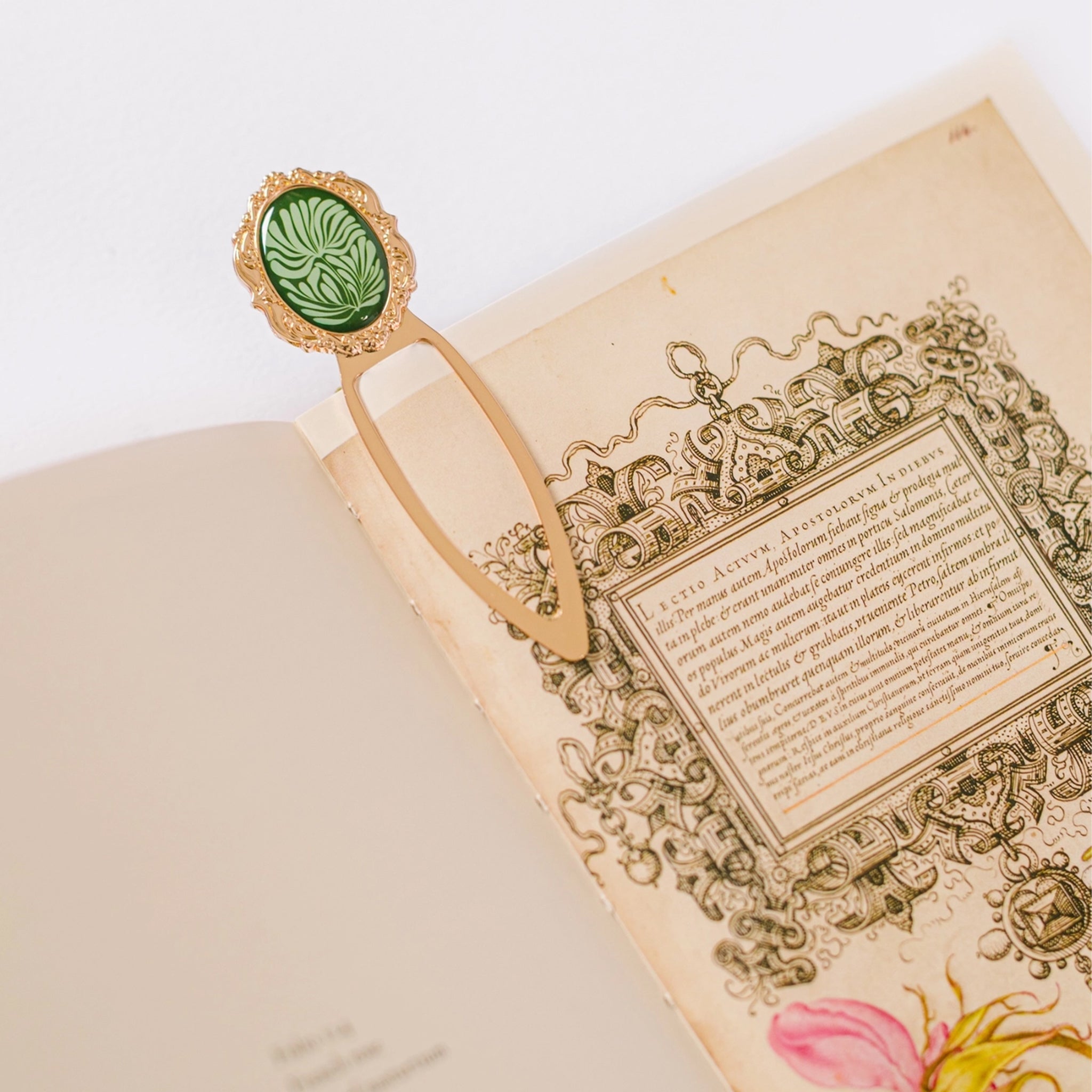 A brass mosaic bookmark. 