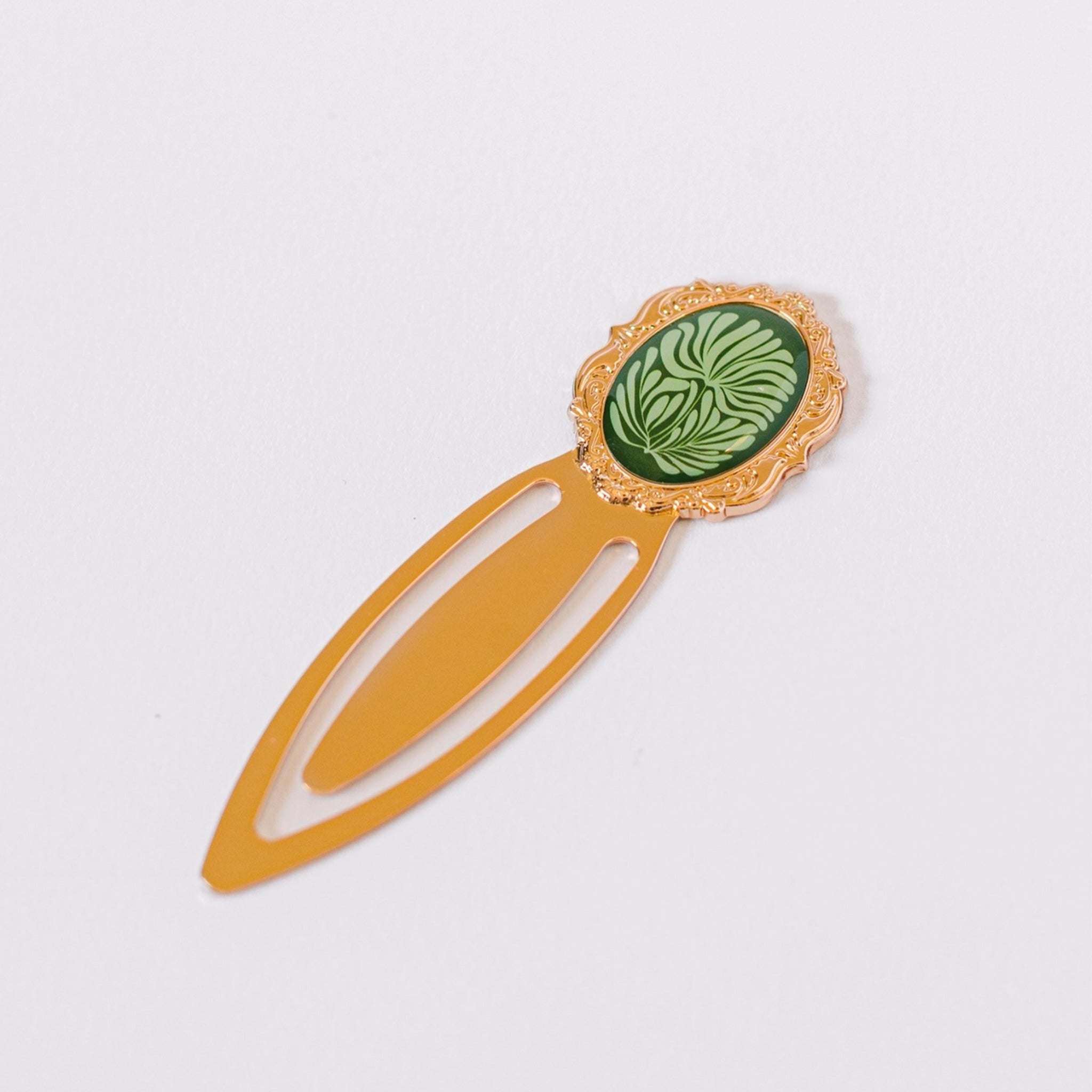 A brass mosaic bookmark. 