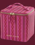 Pink square makeup case with a gold zipper. 