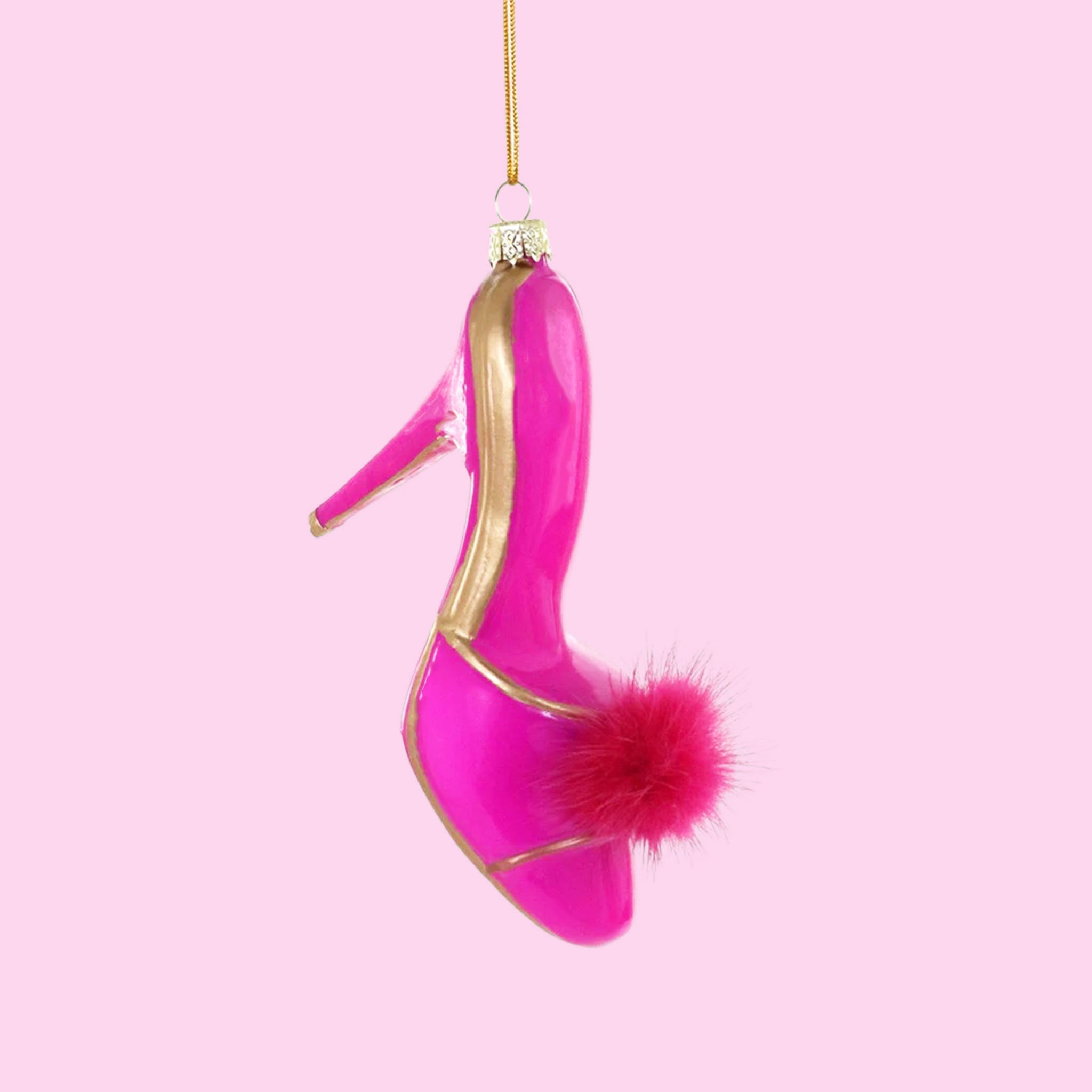 A hot pink high heel shaped ornament. 