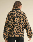 A black and brown leopard print sherpa print jacket. 
